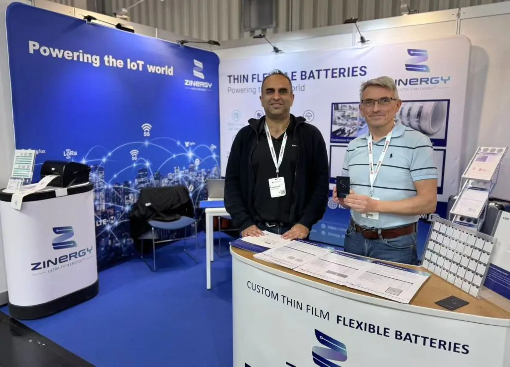 Zinergy's team presenting their thin and flexible batteries at their booth at the EW conference
